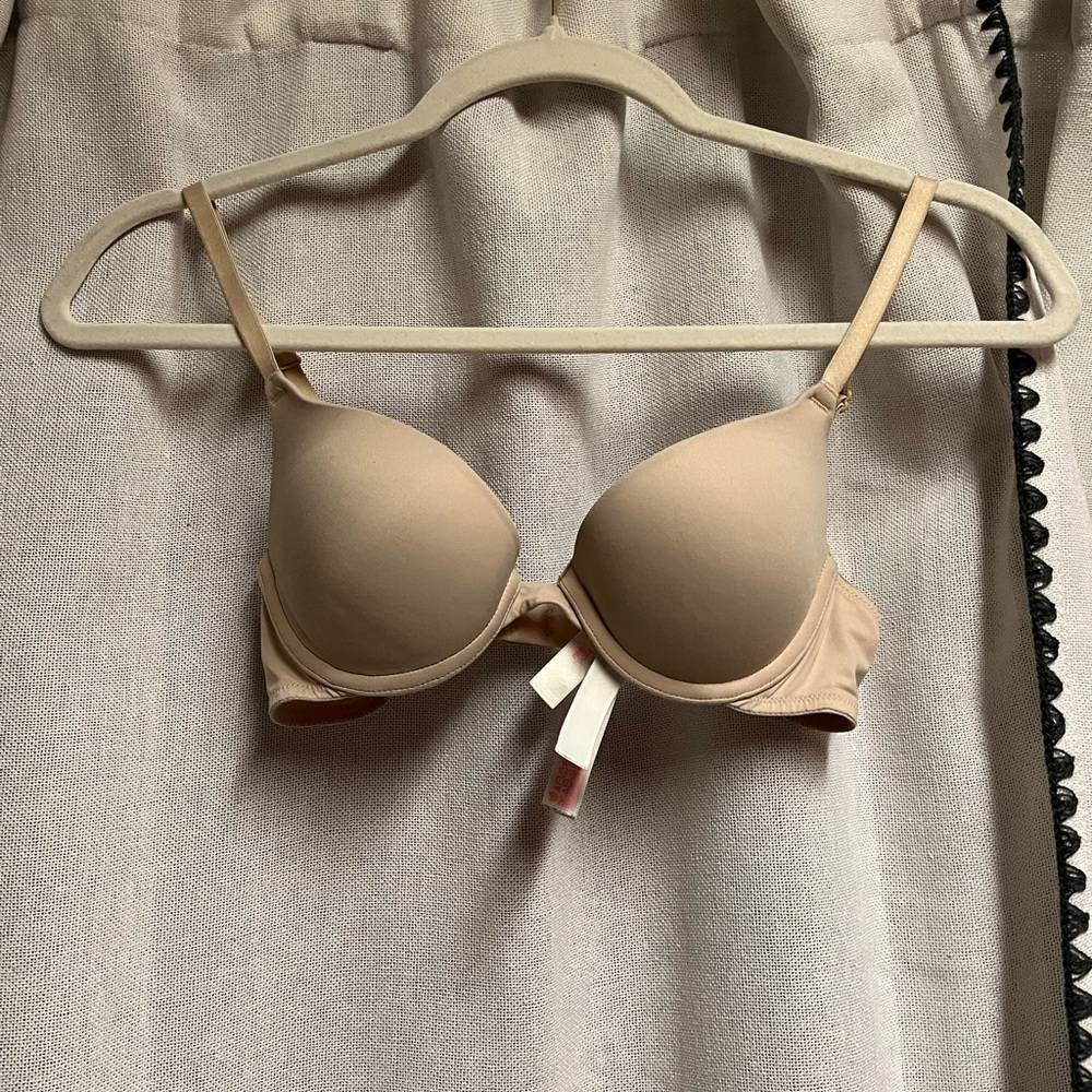 Tan 32AA Victoria’s Secret Pink t-shirt bra